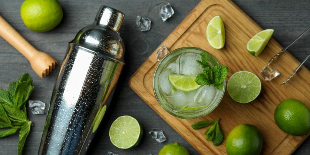 A stylish Cobbler shaker set on a rustic wooden surface, ready for cocktail making.