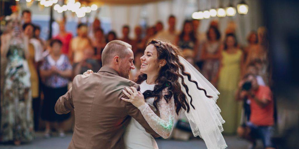 A couple enjoying their first dance at a wedding.