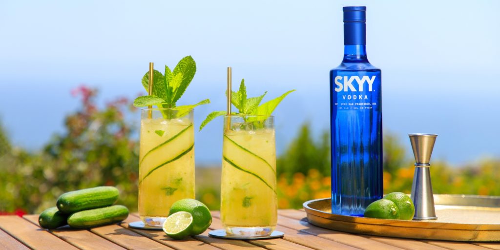 SKYY Vodka Mule cocktails with cucumber, mint and lime garnish