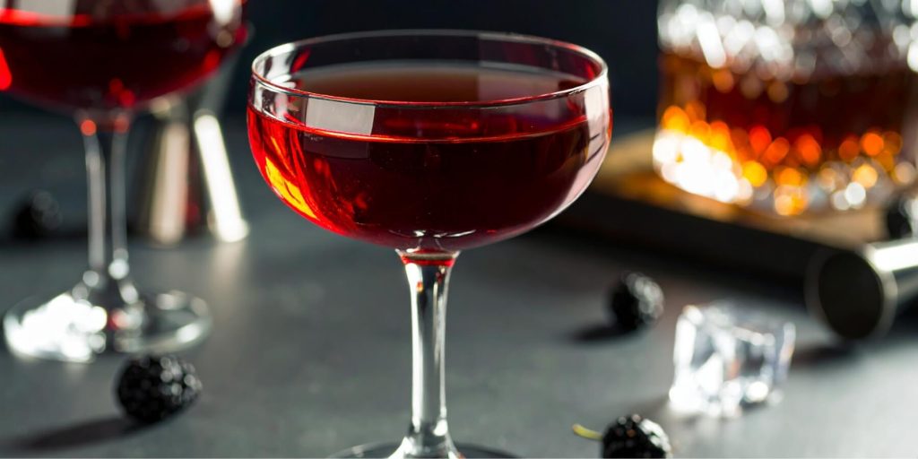 Close-up of a Boulevaridier cocktail served in a coupe glass